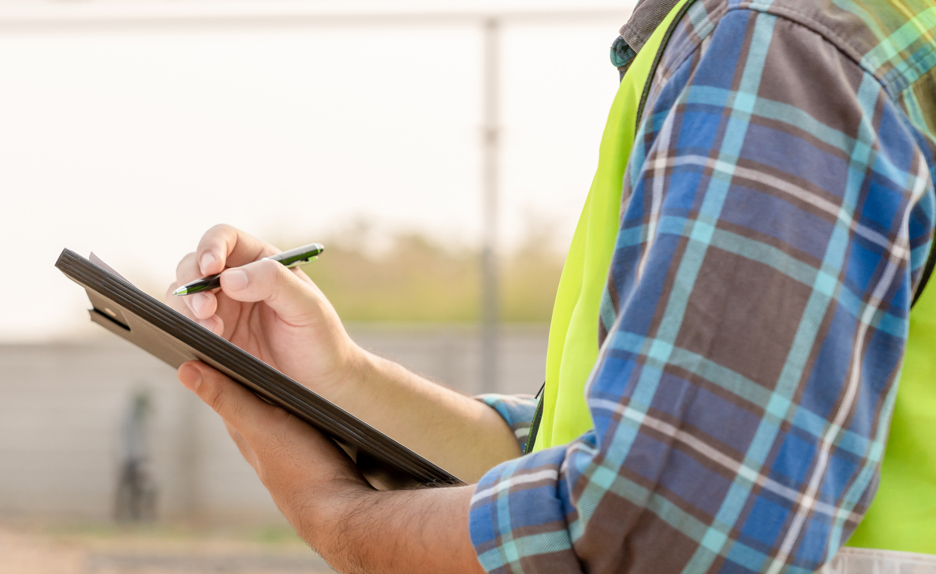 inspector or engineer is inspecting construction and quality assurance new house using a checklist. Engineers or architects or contactor work to build the house before handing it over to the homeowner Home Watch Services